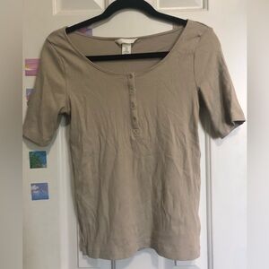 Beige short sleeve Henley top.